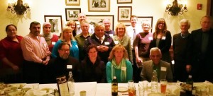 Some of the “Faith Forum” panelists, their spouses and others at a recent dinner celebrating the completion of 200th column.