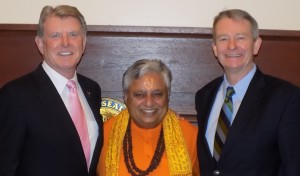 Hindu statesman Rajan Zed (middle) with Governor C. L. "Butch" Otter (left) and Lieutenant Governor Brad Little (right) just before opening the Idaho Senate with its first Hindu prayer on March three.