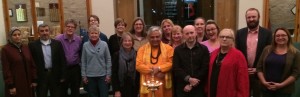 Participants at the multi-faith service. Hindu statesman Rajan Zed is behind the traditional lamp.